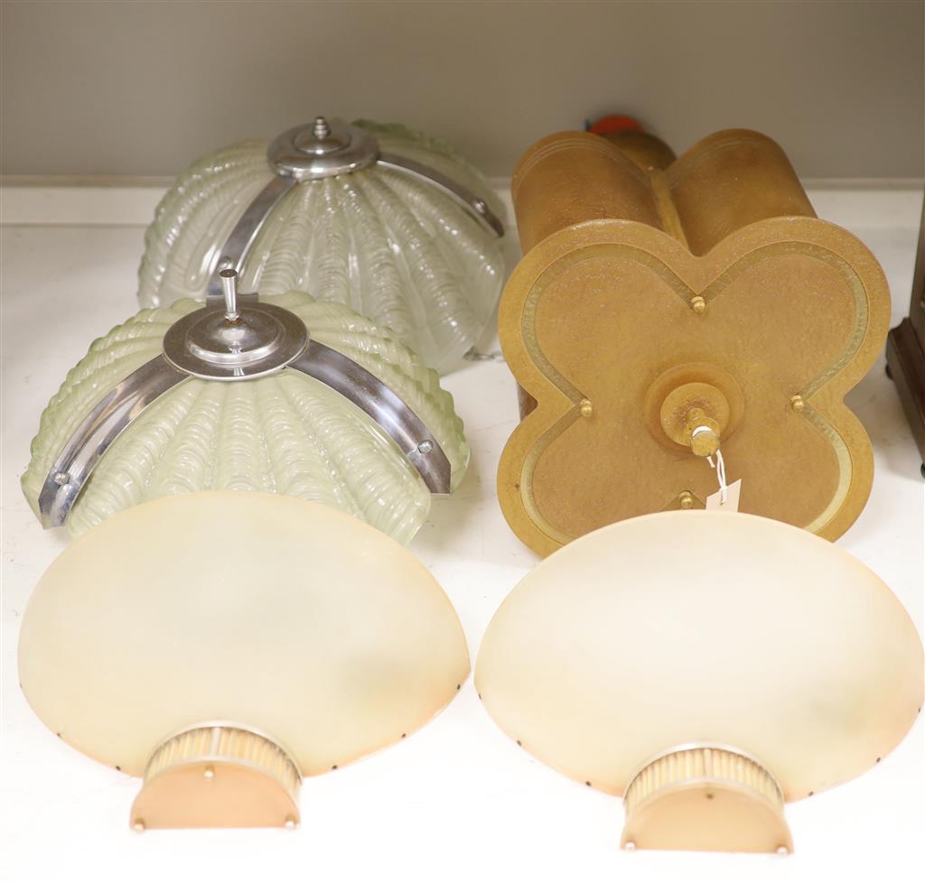 A pair of Art Deco style wall lights, a pair of similar shell plaffoniers and a hanging light